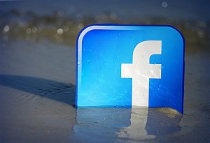 facebook logo at the beachfront